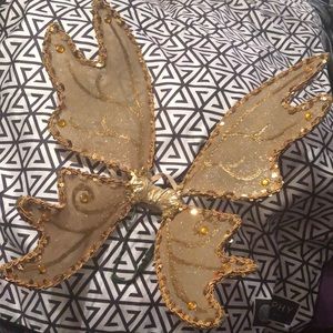 Wings completely hand sewn gold
